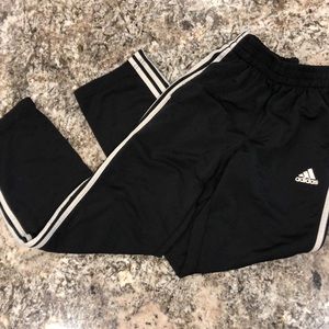 Black striped adidas track pants